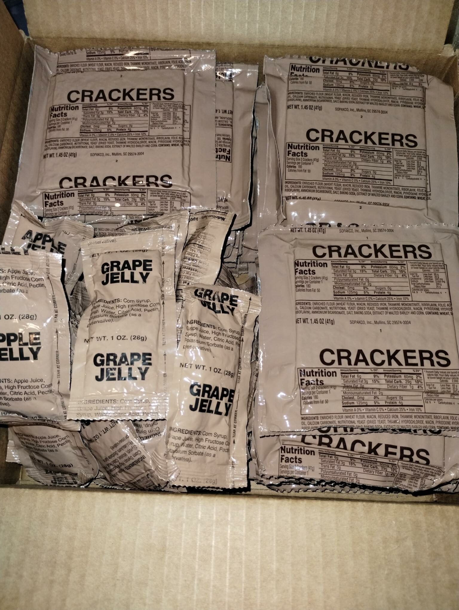 Case of 30 Crackers packets and 30 packets of assorted jams and jelly